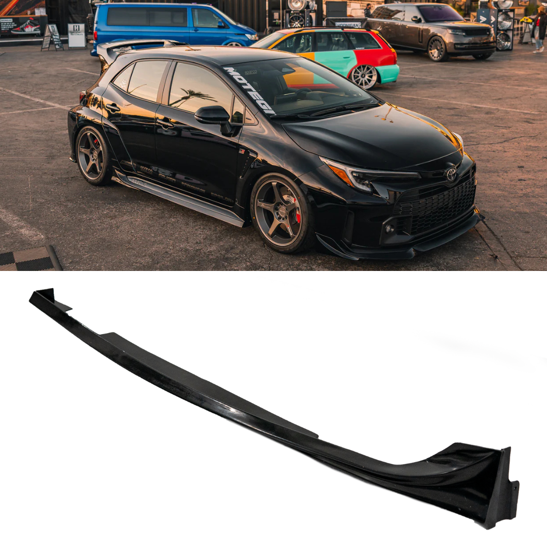 Black GR Corolla with side skirts at a car meet