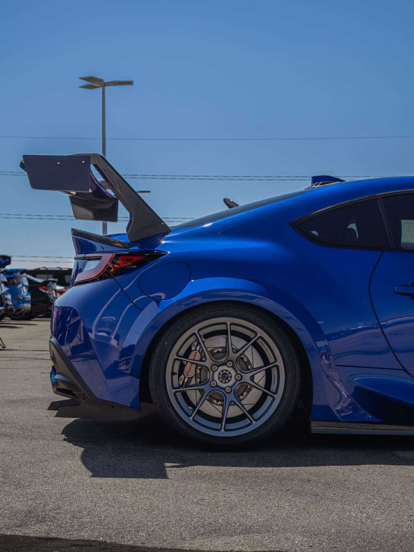Close-up of the GT wing and rear window on a blue BRZ ZN8