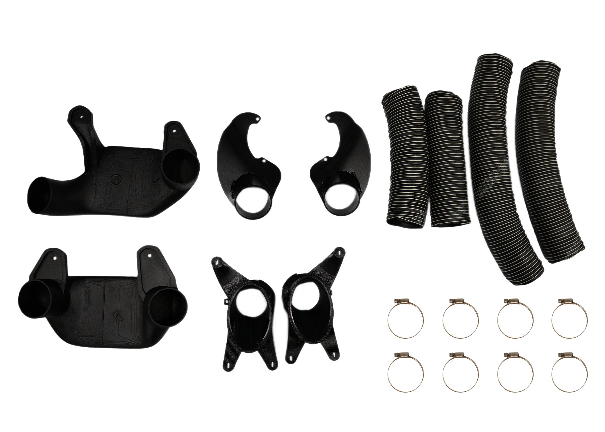 Full brake duct kit contents: bumper ducts, pancake ducts, rotor ducts, and hose laid out