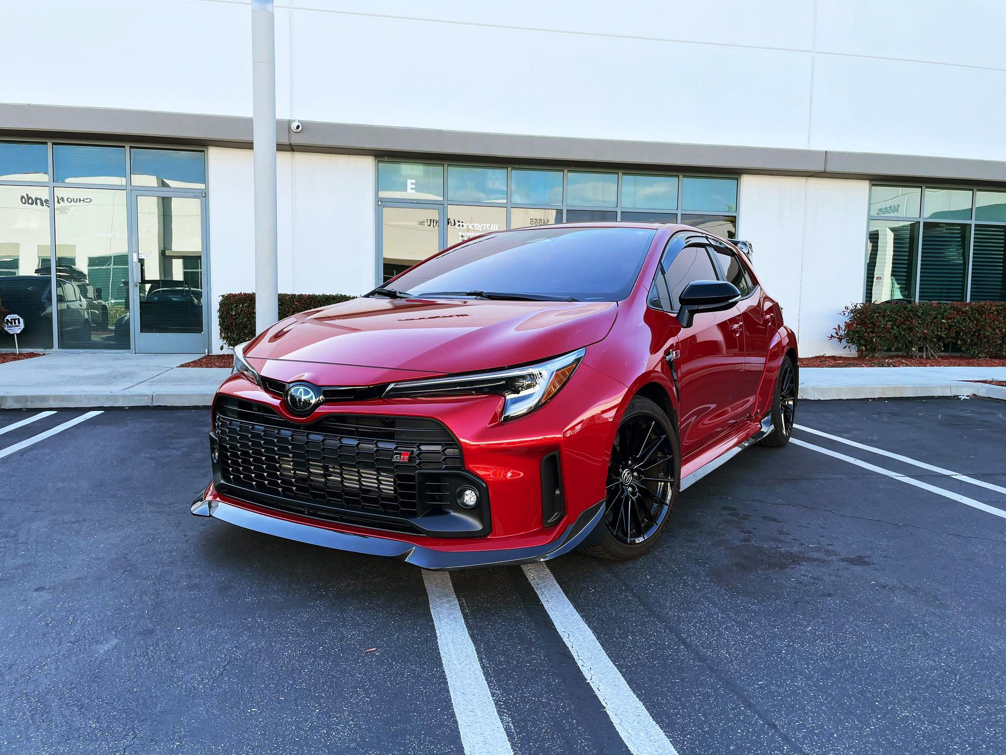 Studio render of the carbon fiber side skirt and front lip kit for the GR Corolla