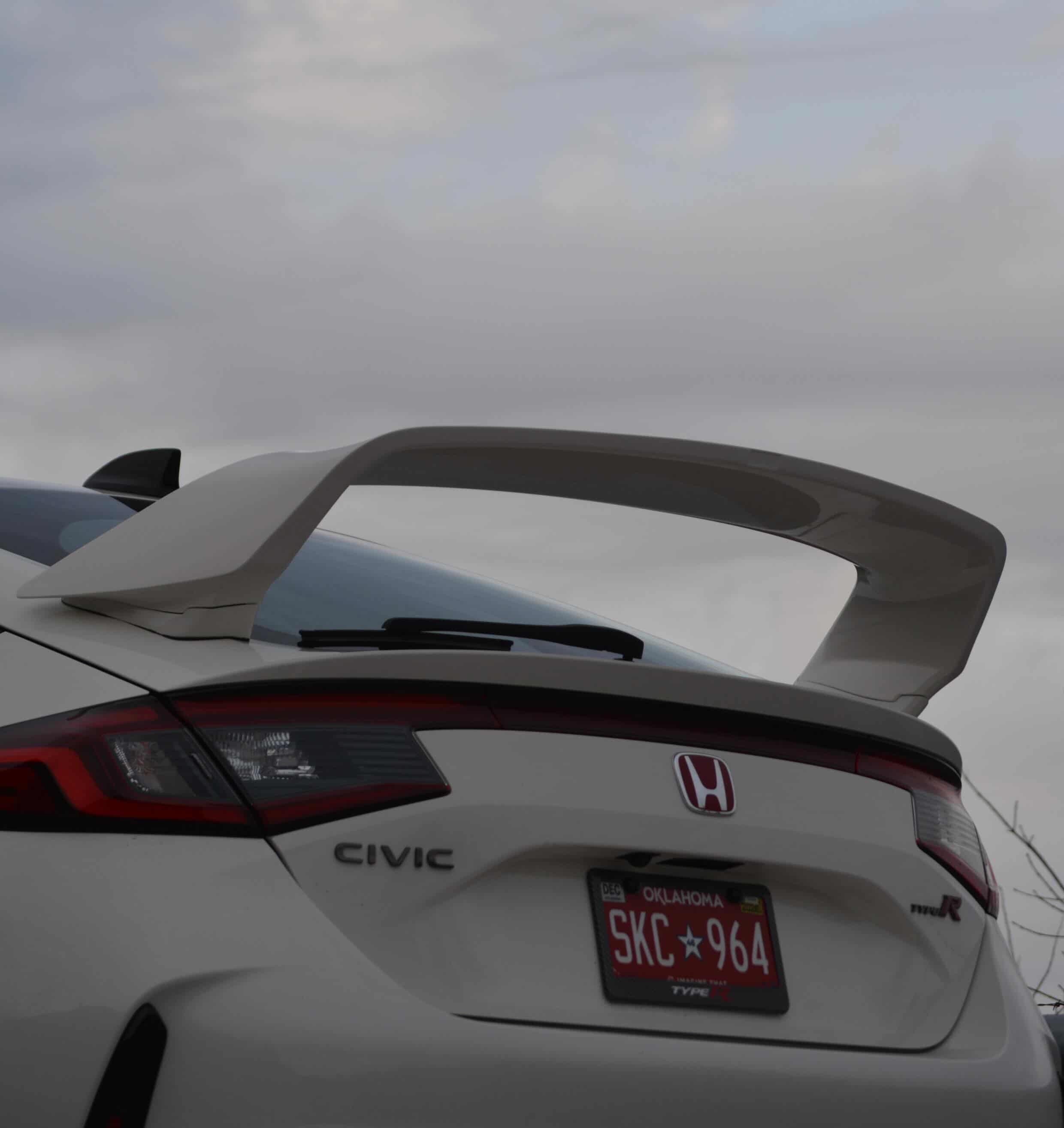 Close-up of the Epsilon+ Sport Wing on the trunk of a white Honda Civic FL5
