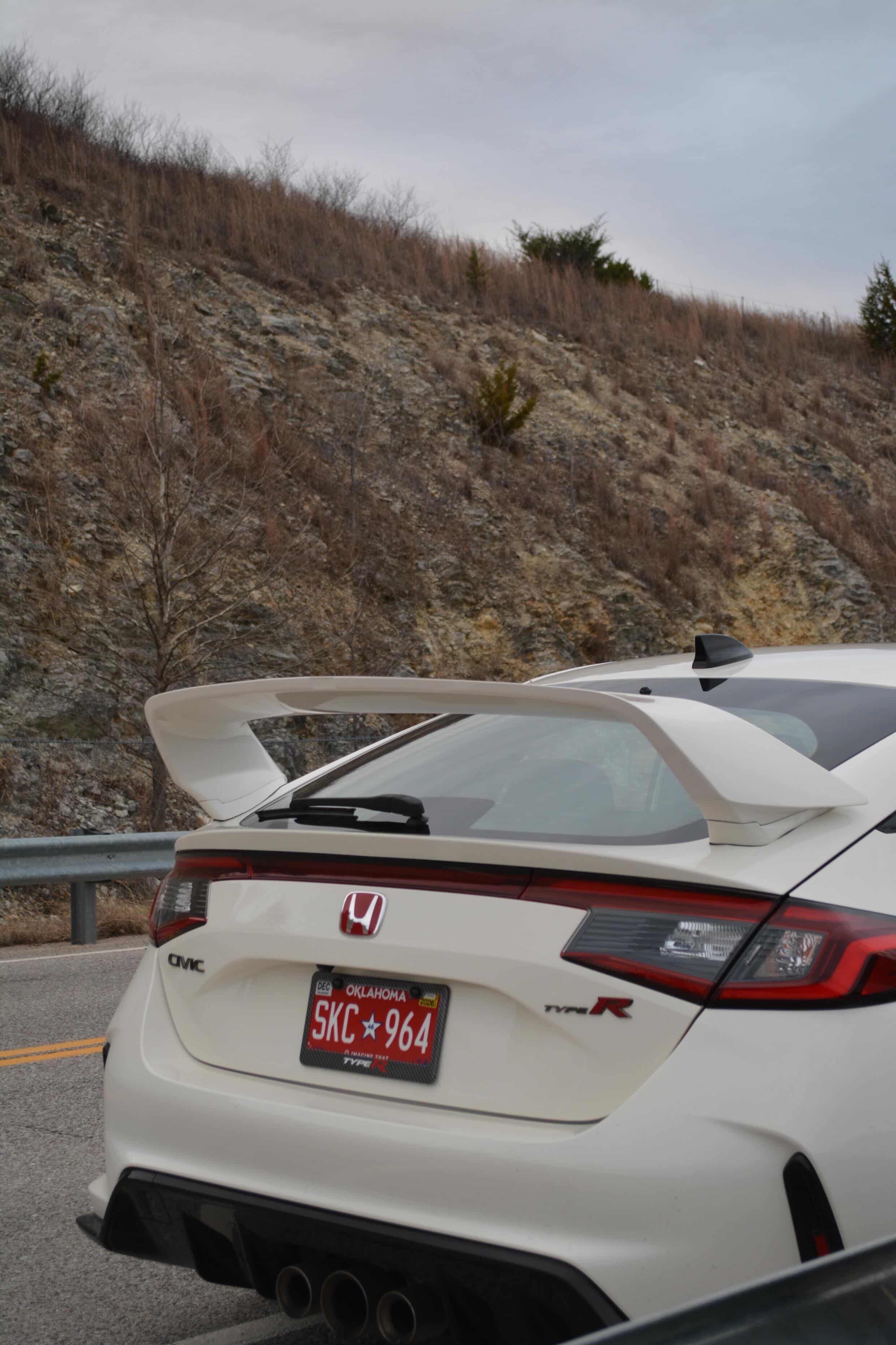 Rear view of a white Honda Civic FL5 with the Epsilon+ Sport Wing