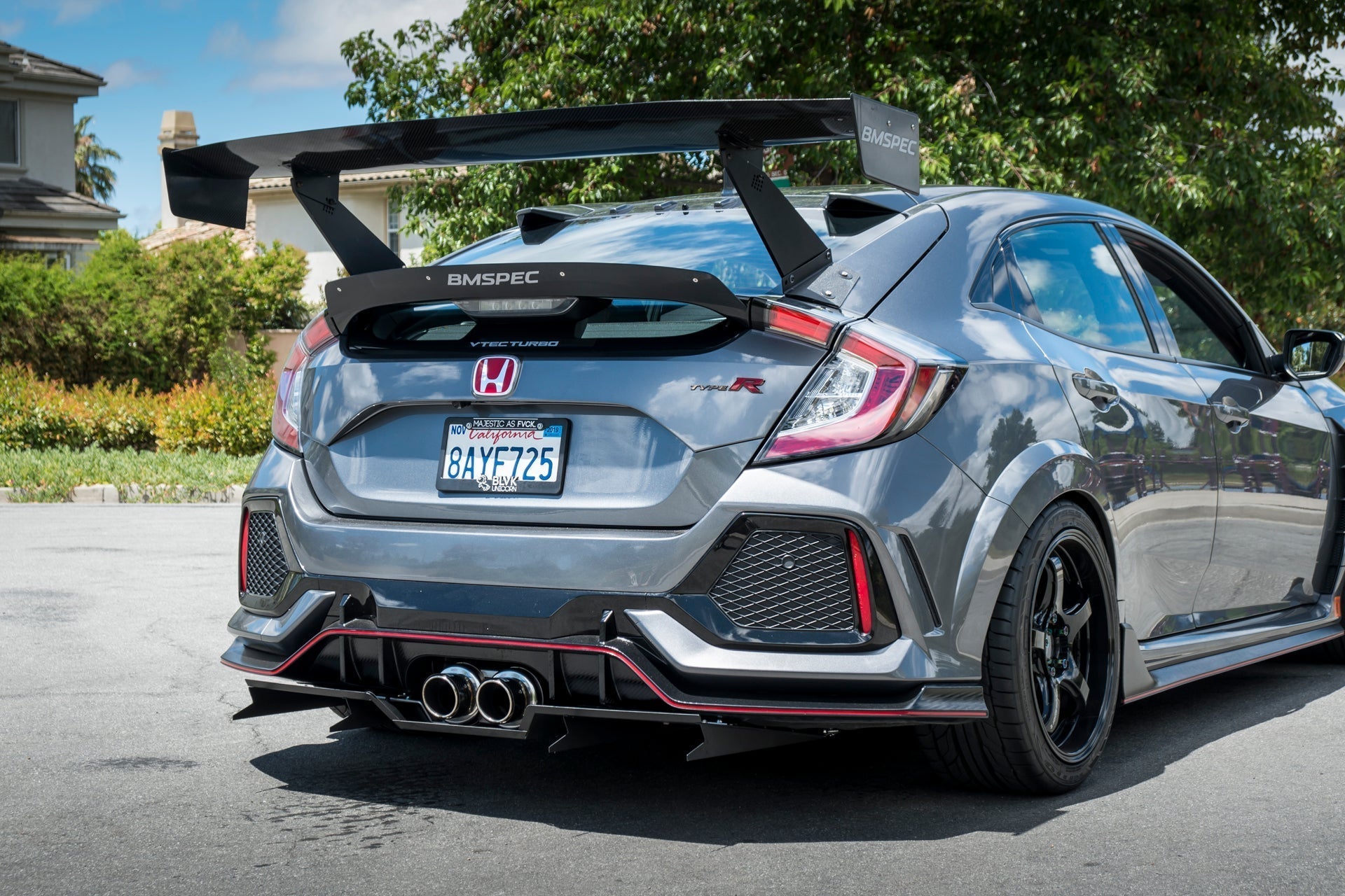 Gray Civic Type R rear three-quarter view showing Epsilon+ GT wing mount