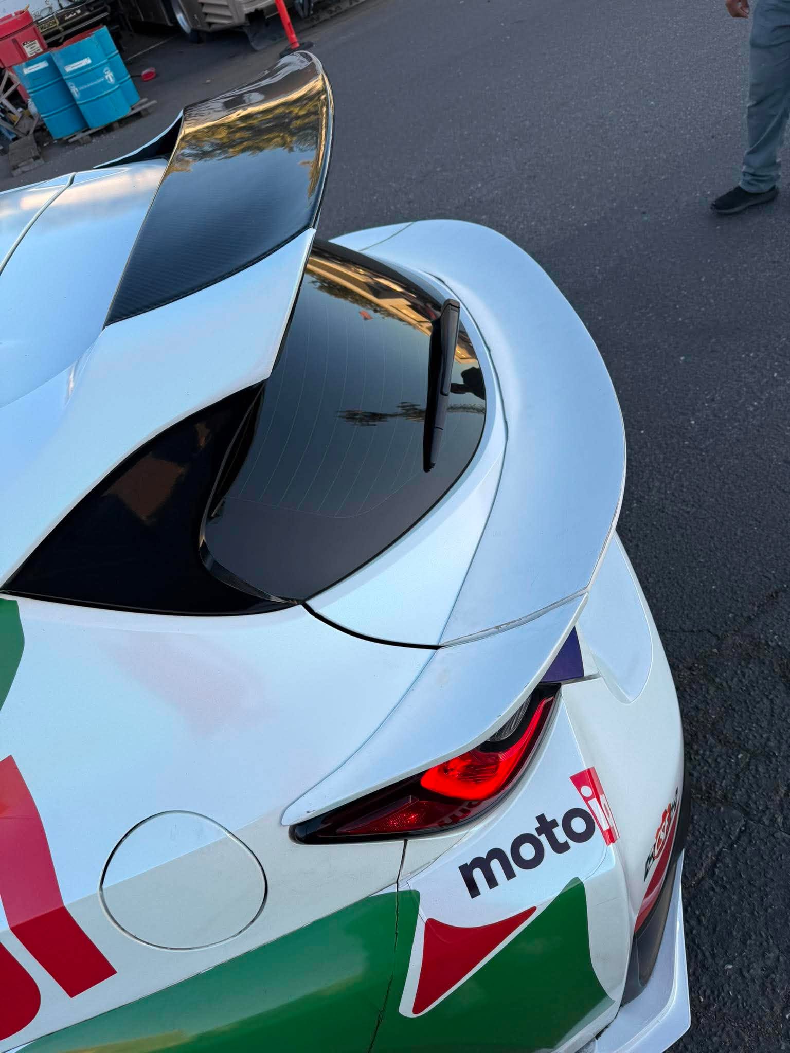 Close-up of the Epsilon+ mid wing spanning the rear glass of a Corolla Hatchback