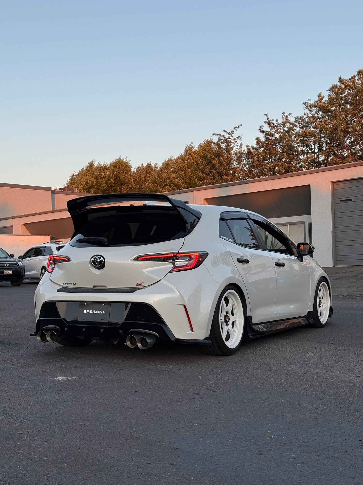 Rear three-quarter view of a white Corolla Hatchback with Epsilon+ rear spats
