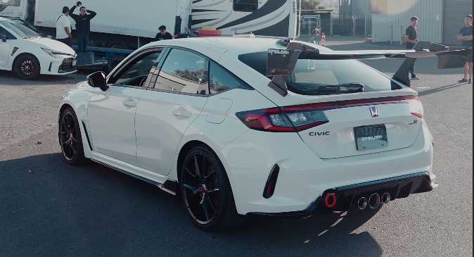 Rear three-quarter view of a white Honda Civic Type R FL5 with the Epsilon+ GT wing