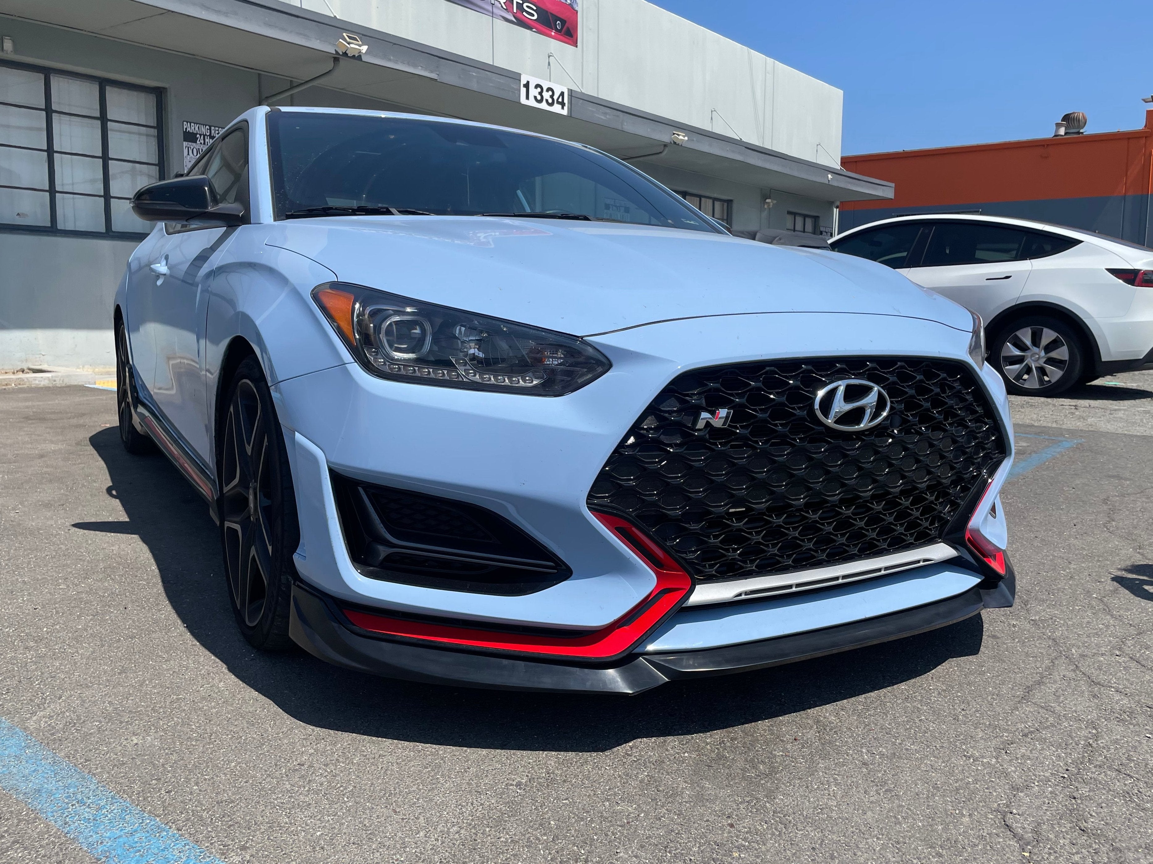 Front-on view of a Hyundai Veloster N fitted with the Epsilon+ front lip