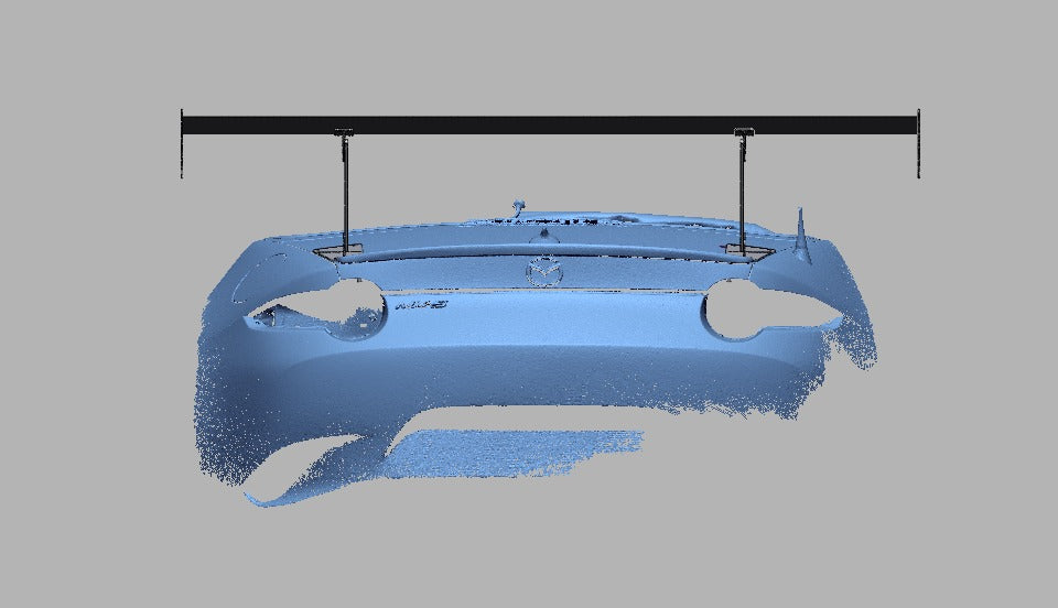 Rear elevation of a Mazda Miata ND with the 66.5" TC Wing, showing the element extending past both rear fenders