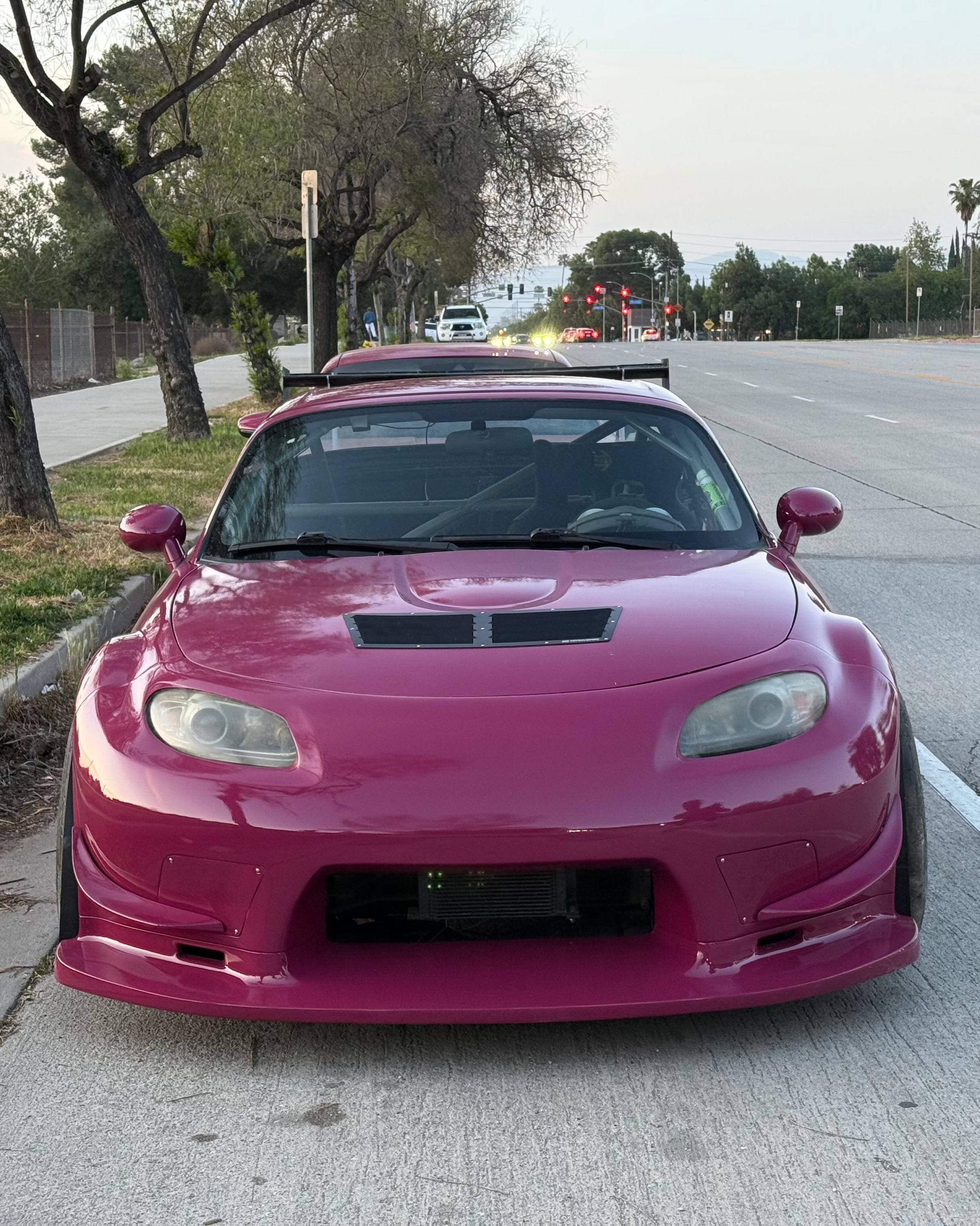 Front-on view of a pink Mazda MX-5 Miata NC fitted with Epsilon+ canards