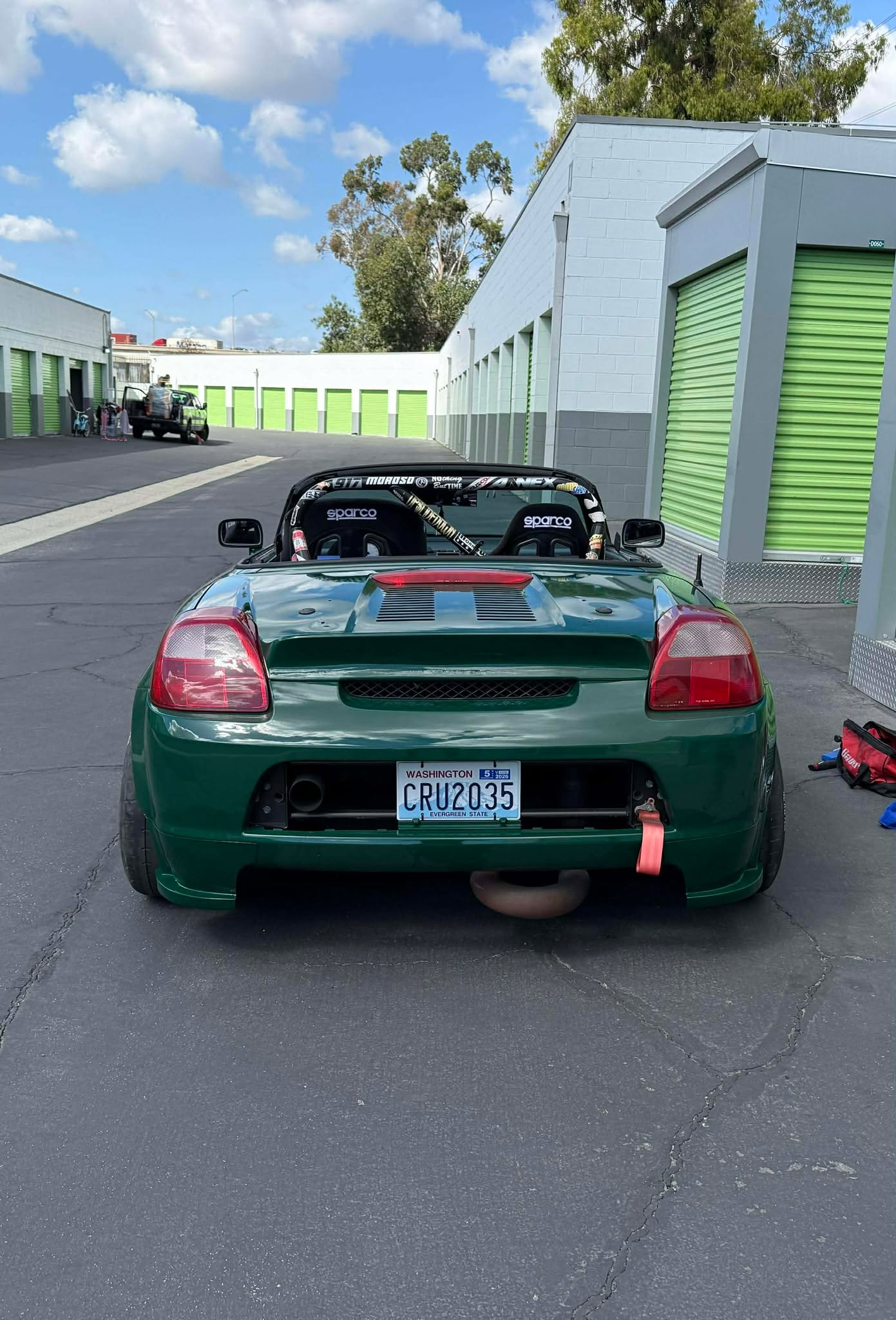 Rear view of a green Toyota MR2 Spyder fitted with the Epsilon+ duckbill spoiler