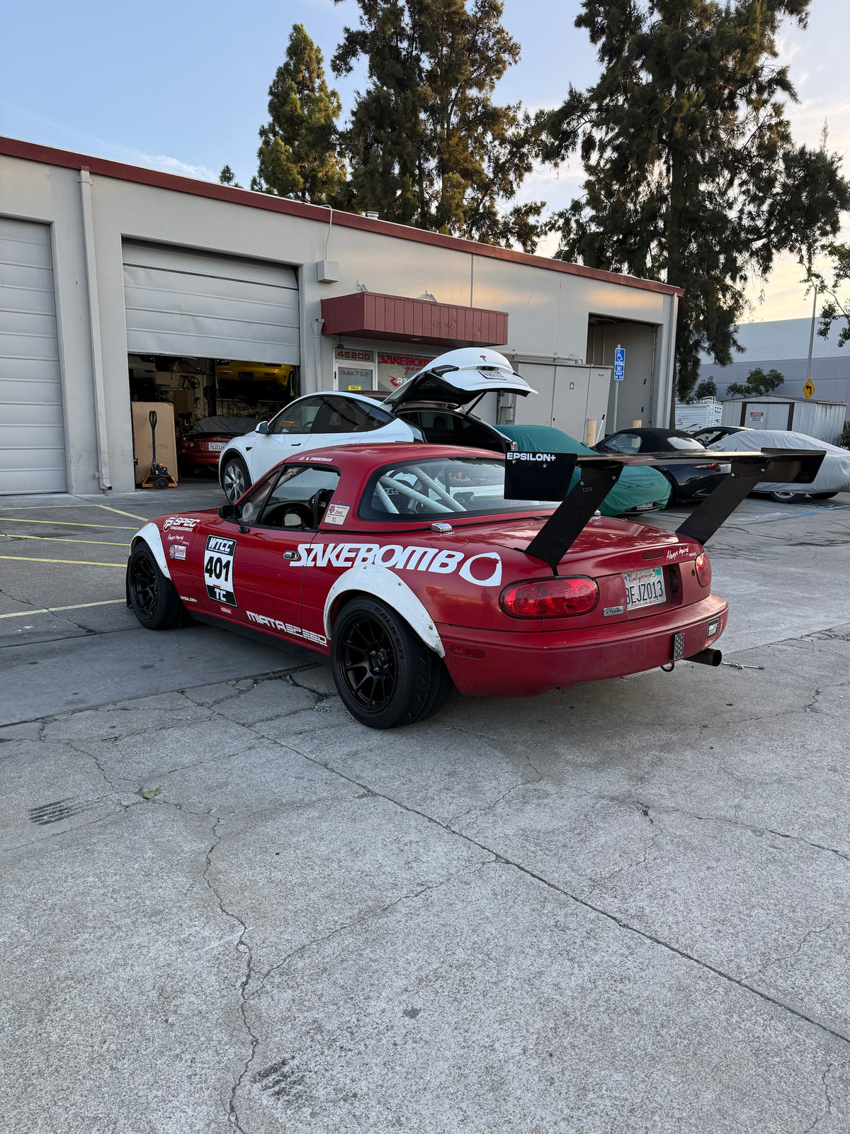Epsilon+ TC Wing uprights and endplate on NA Miata, low rear quarter angle