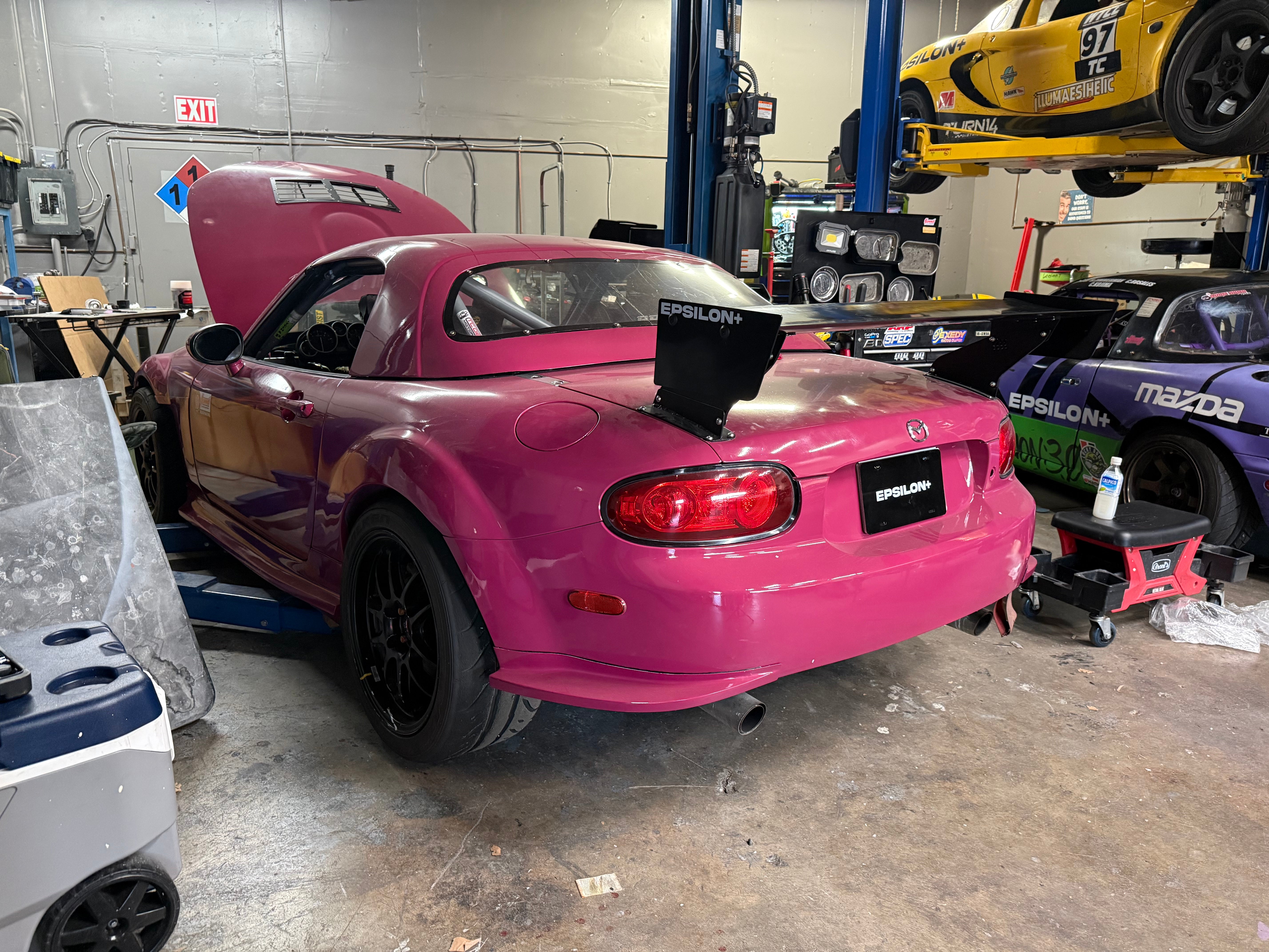Epsilon+ TC Wing installed on Mazda Miata NC, rear 3/4 view in shop