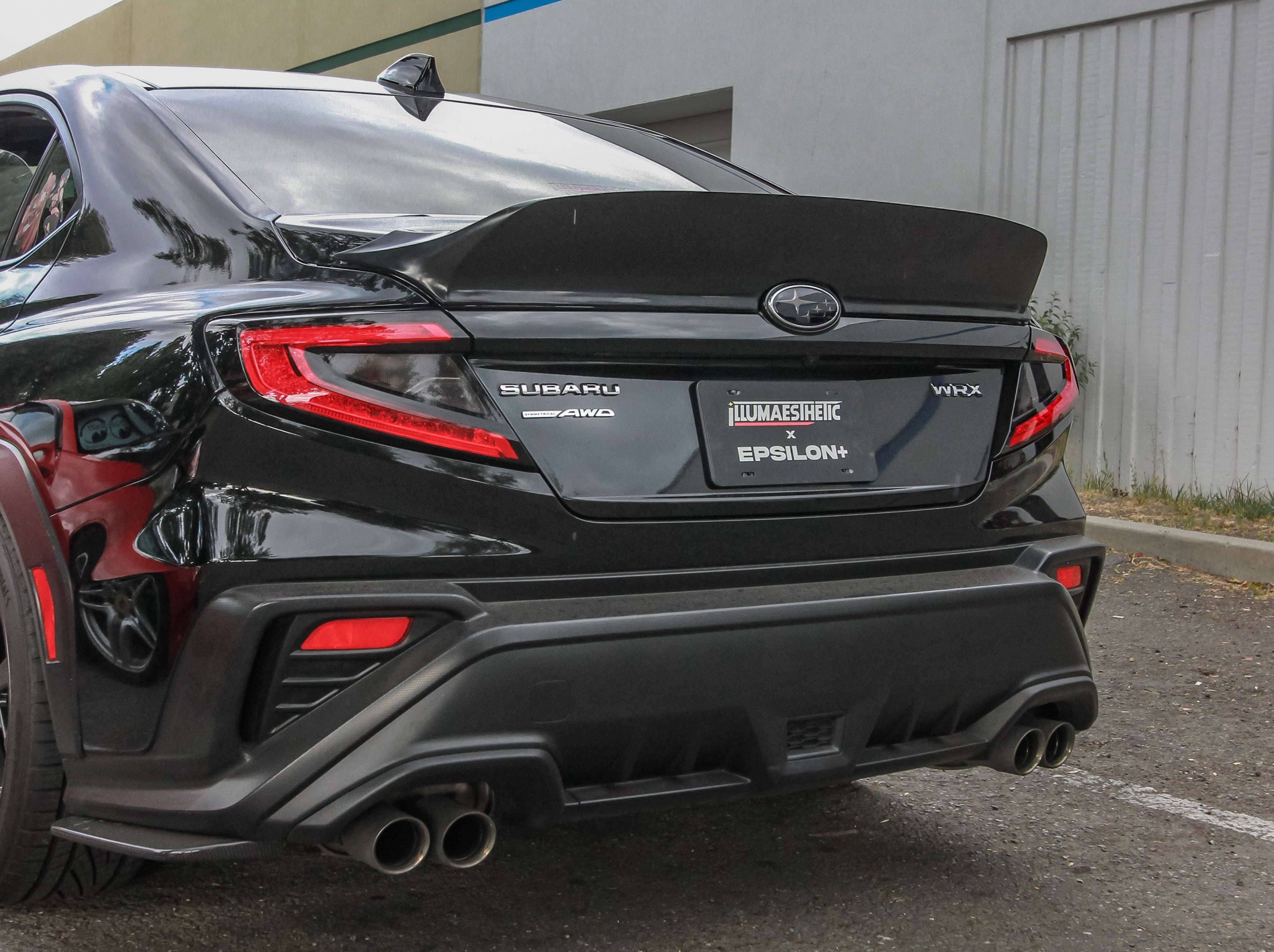 Rear three-quarter view of a black Subaru WRX VB with the Epsilon+ rear duckbill