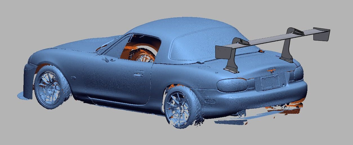 3D scan render of a Mazda Miata NB with the TC wing, driver-side rear three-quarter view