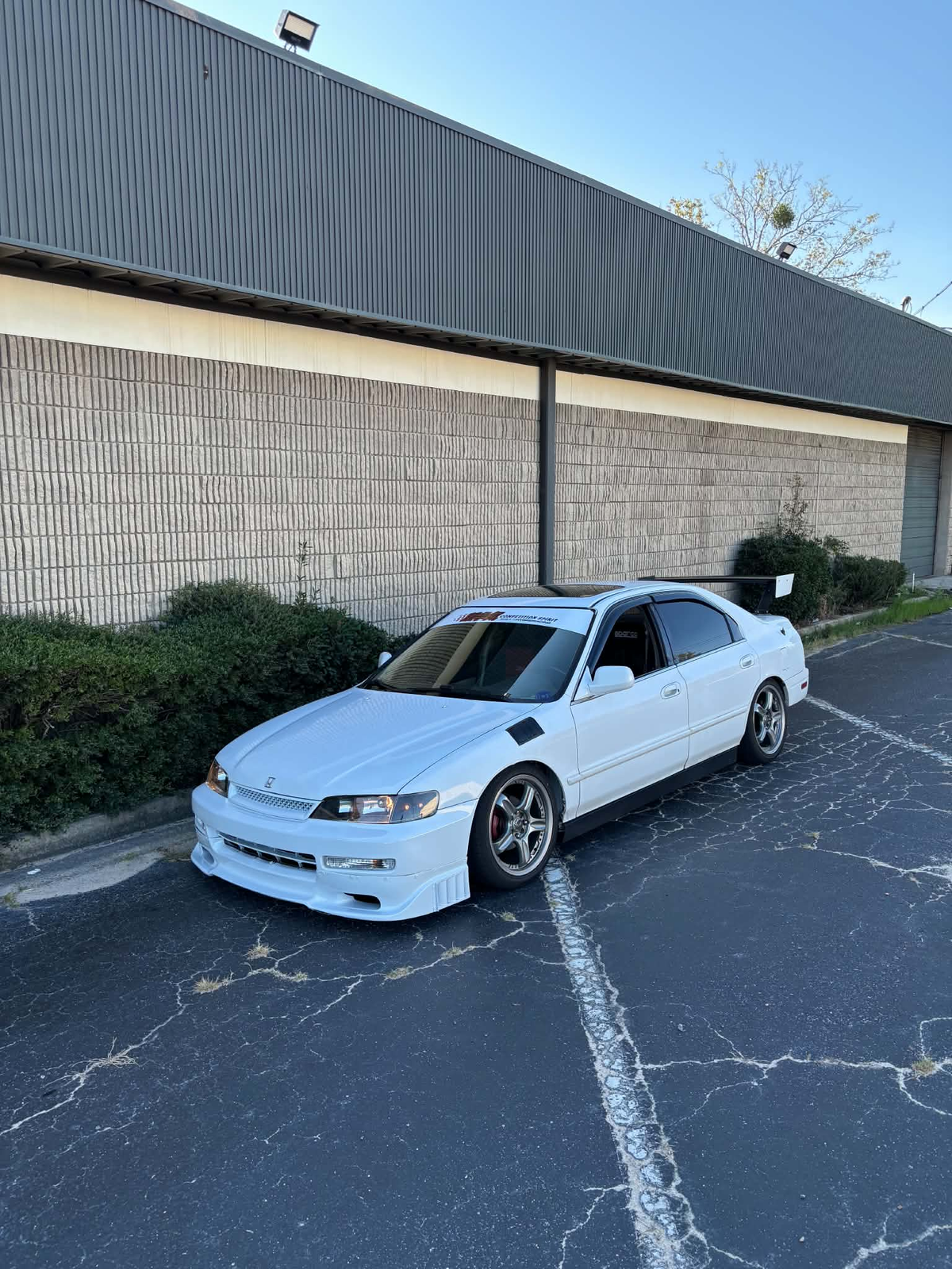 Honda Accord CD5 with the TC Wing installed, low front three-quarter view showing front lip and wing