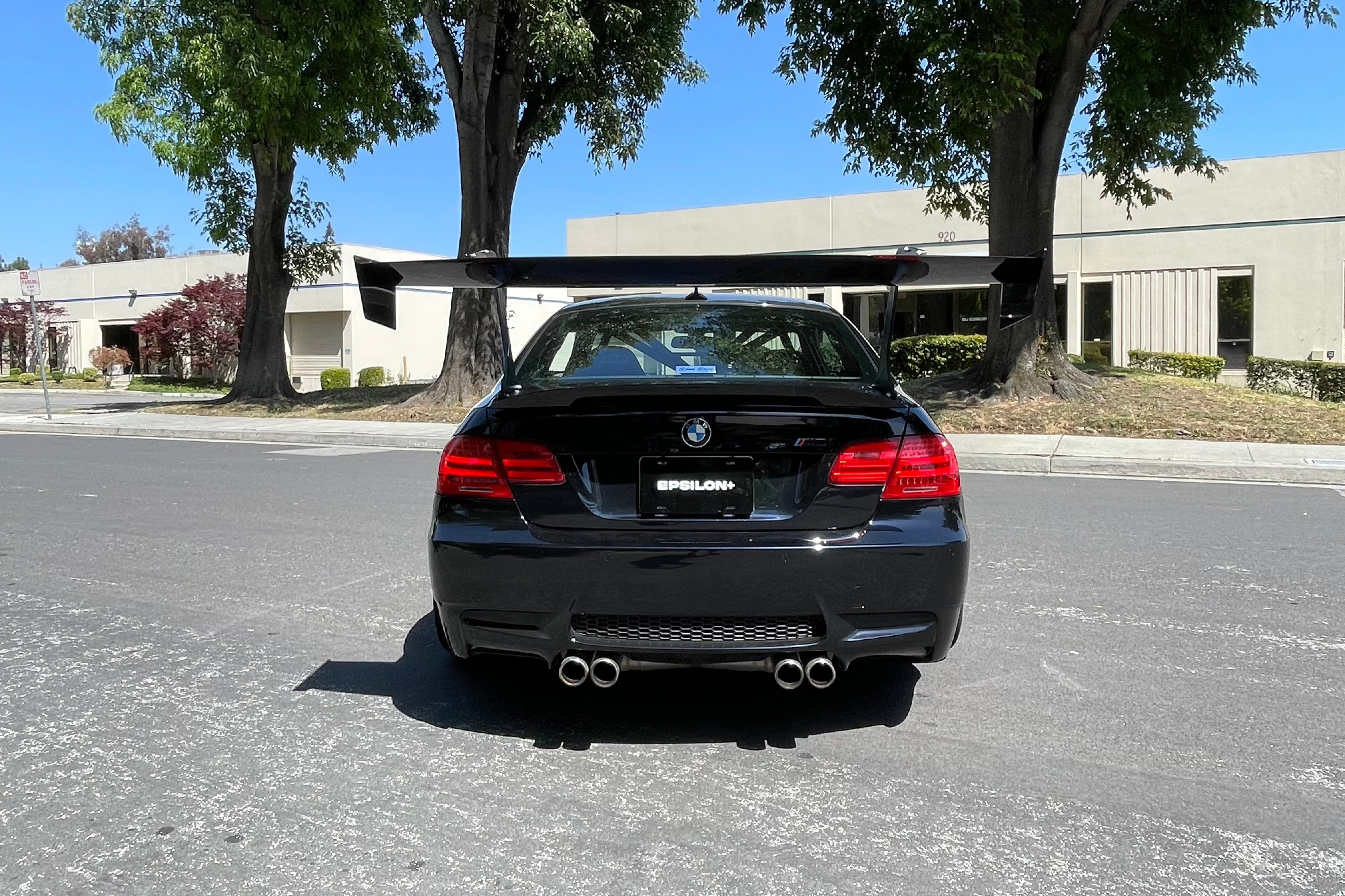 Close rear view of a black BMW E92 M3 with the Epsilon+ GT wing
