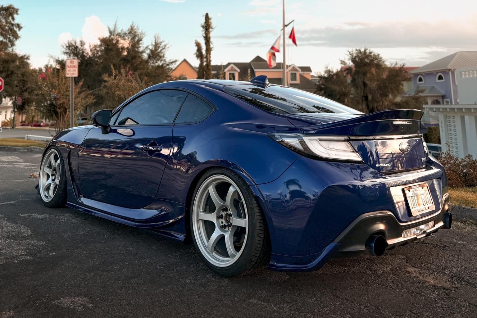 Rear three-quarter view of a dark blue Subaru BRZ ZN8 with rear spats