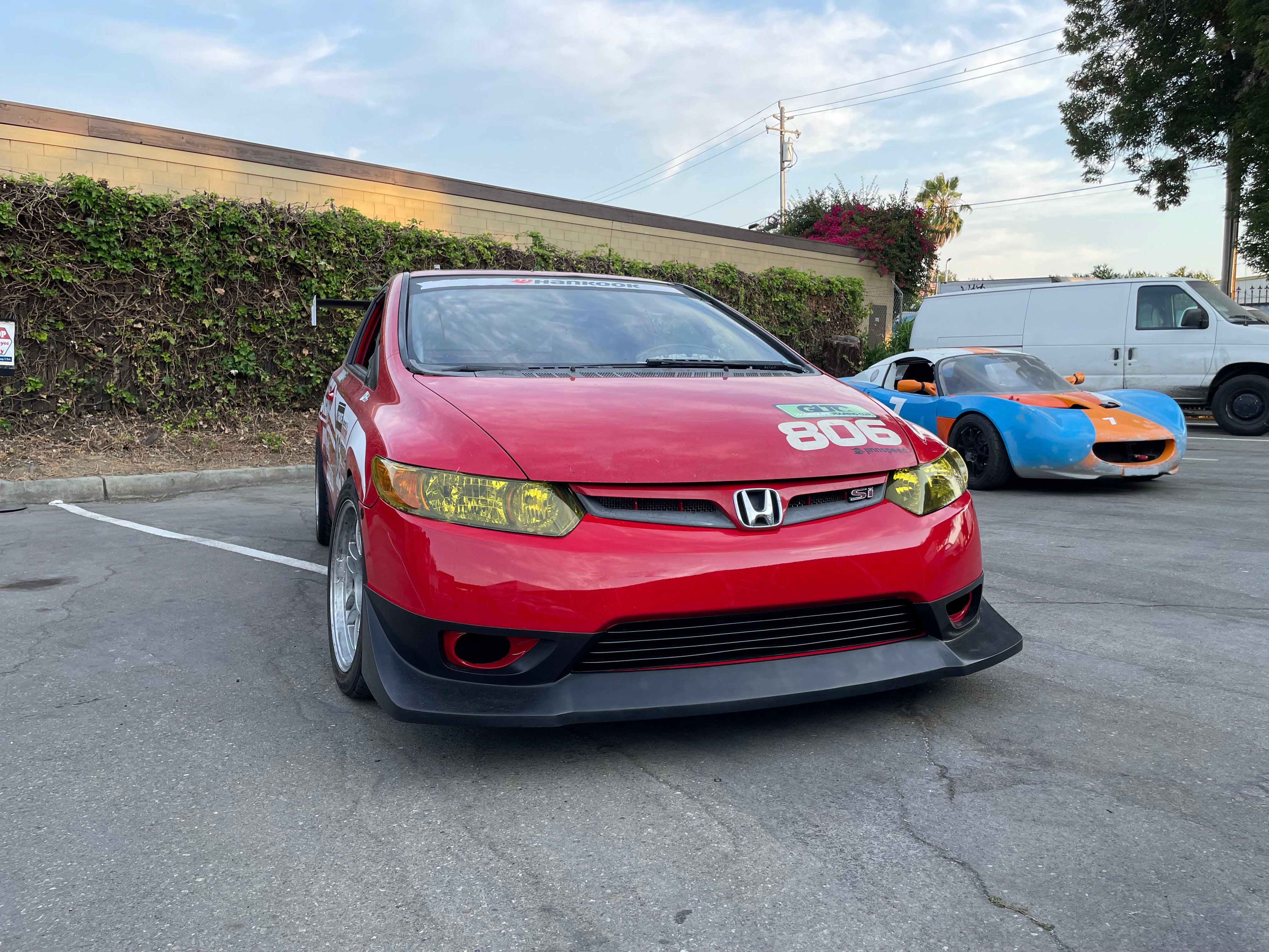 Red Honda Civic Coupe FG2 with the Epsilon+ front lip at a meet