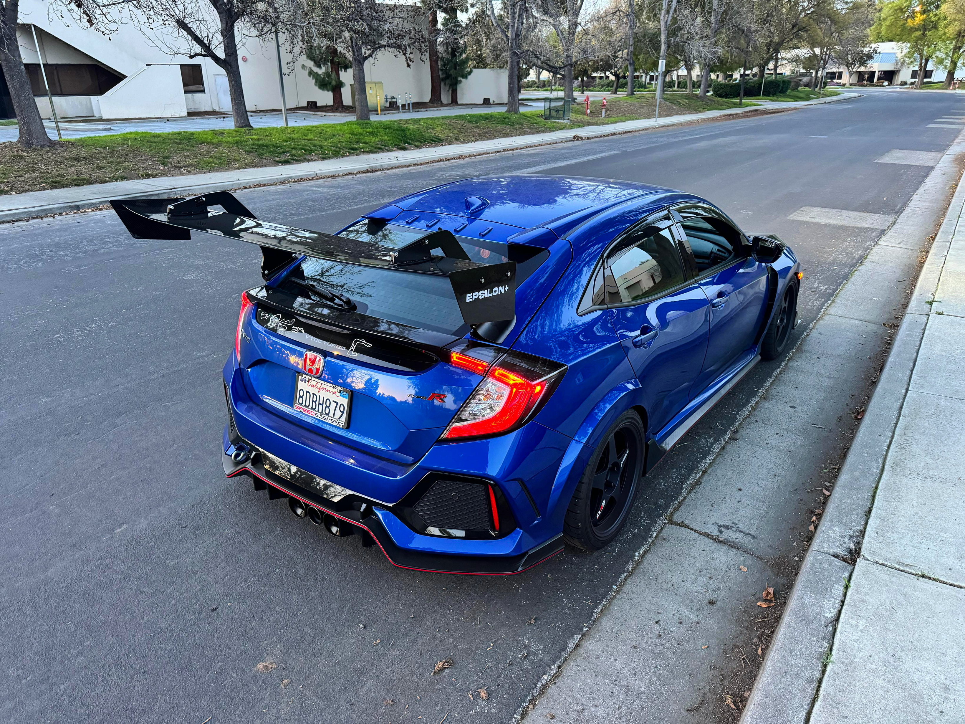 Blue Civic Type R FK8 parked with Epsilon+ motorsport rear wing, elevated rear view