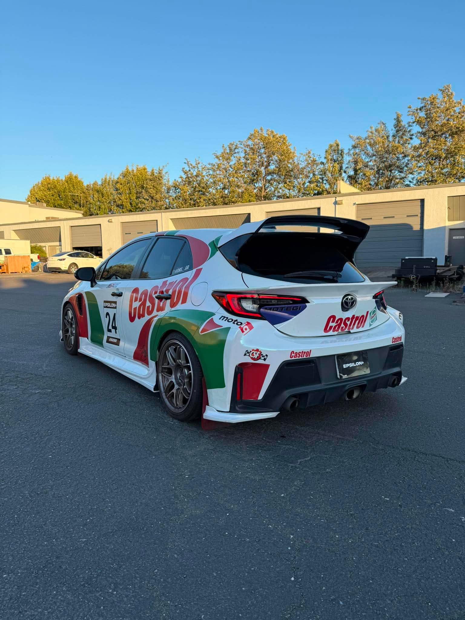 Castrol-liveried Toyota Corolla Hatchback with the Epsilon+ mid wing, rear three-quarter view