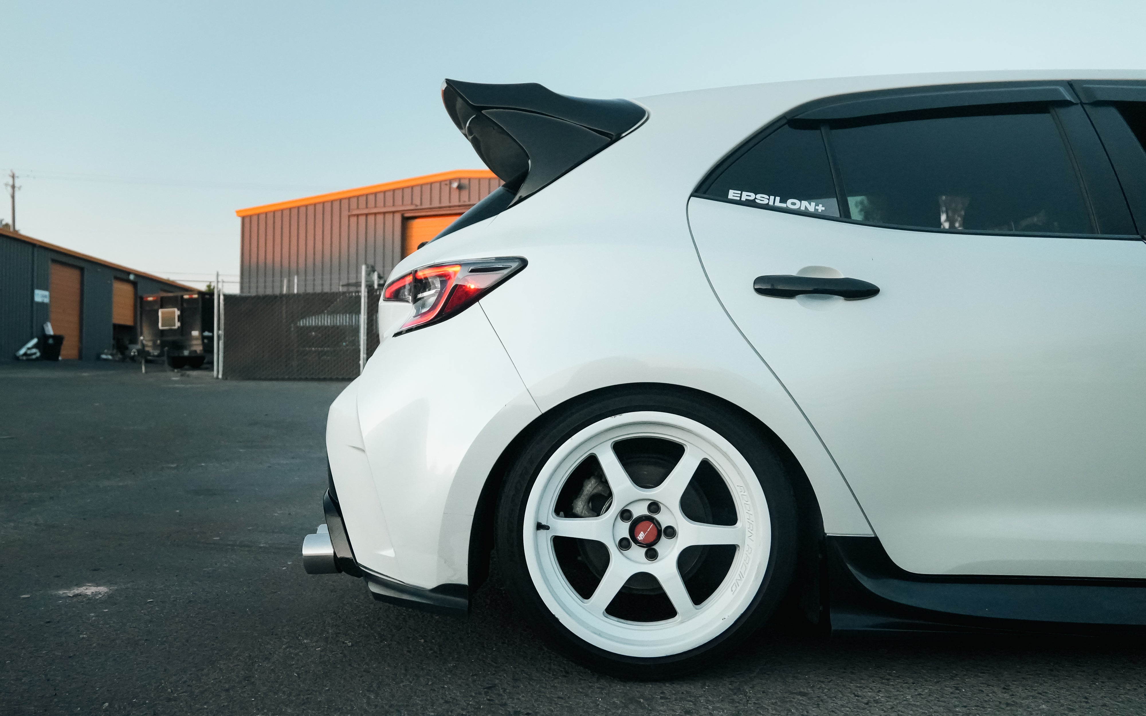 Close-up of the Epsilon+ rear spat behind the wheel of a white Corolla Hatchback