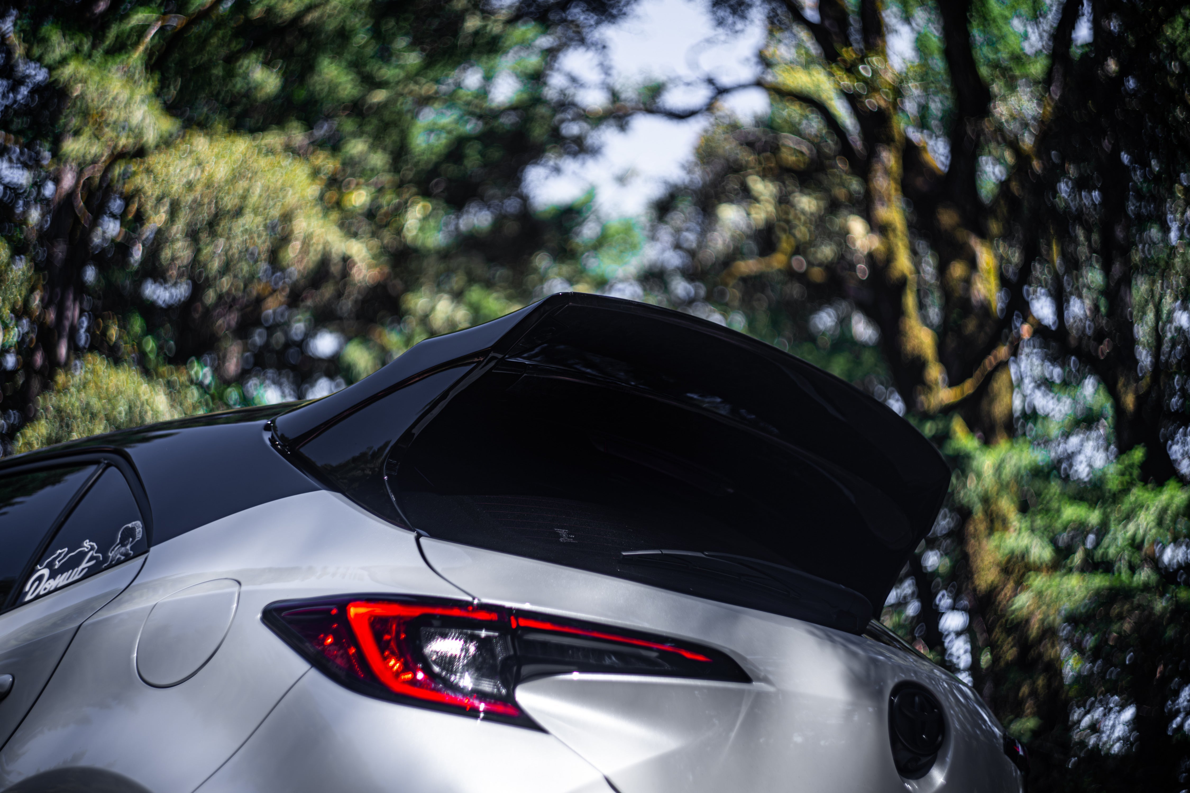 Close-up rear view of the WRC Wing V3 on a silver Corolla Hatchback