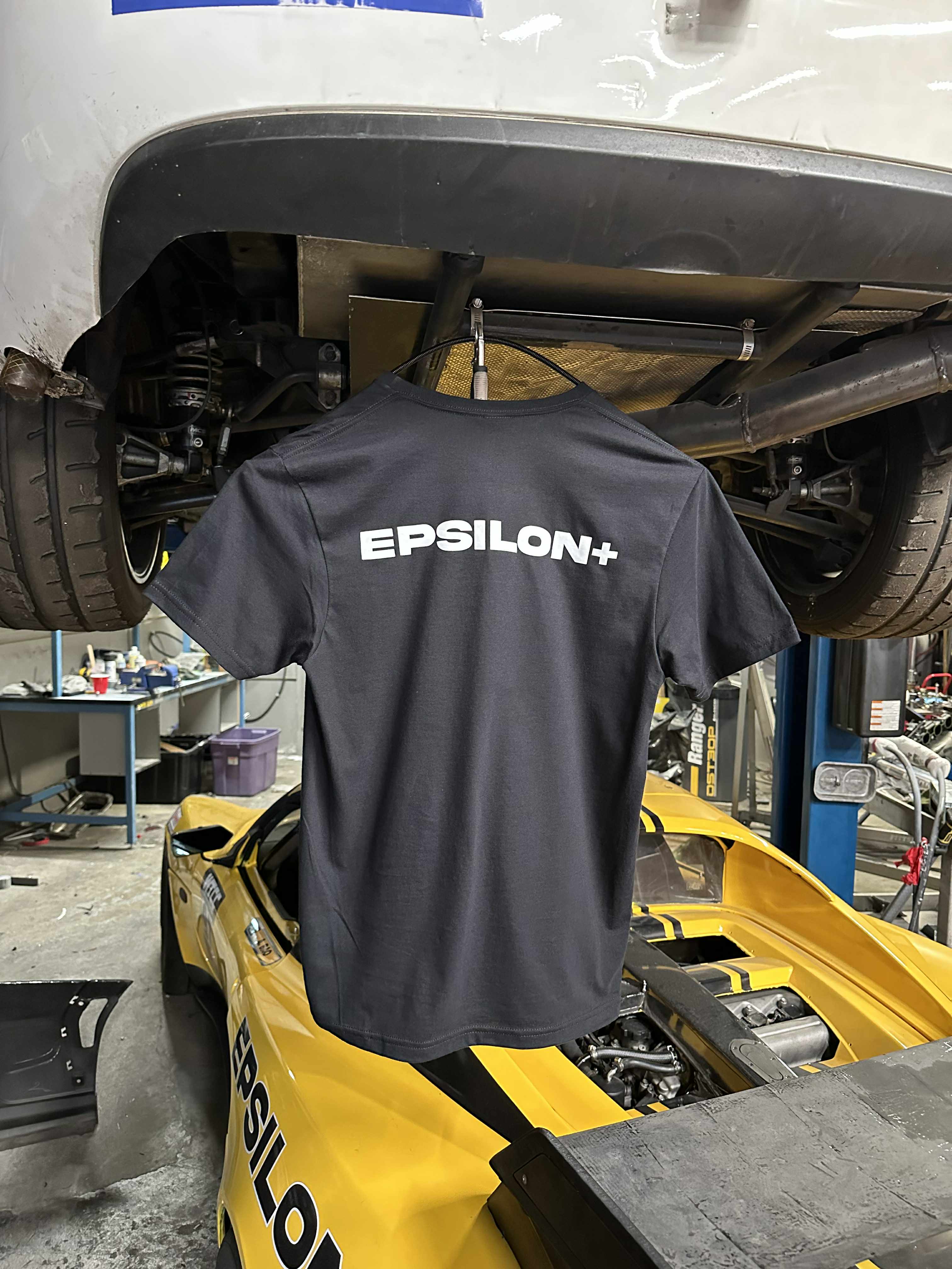 Grey Epsilon+ t-shirt showing the large EPSILON+ back print