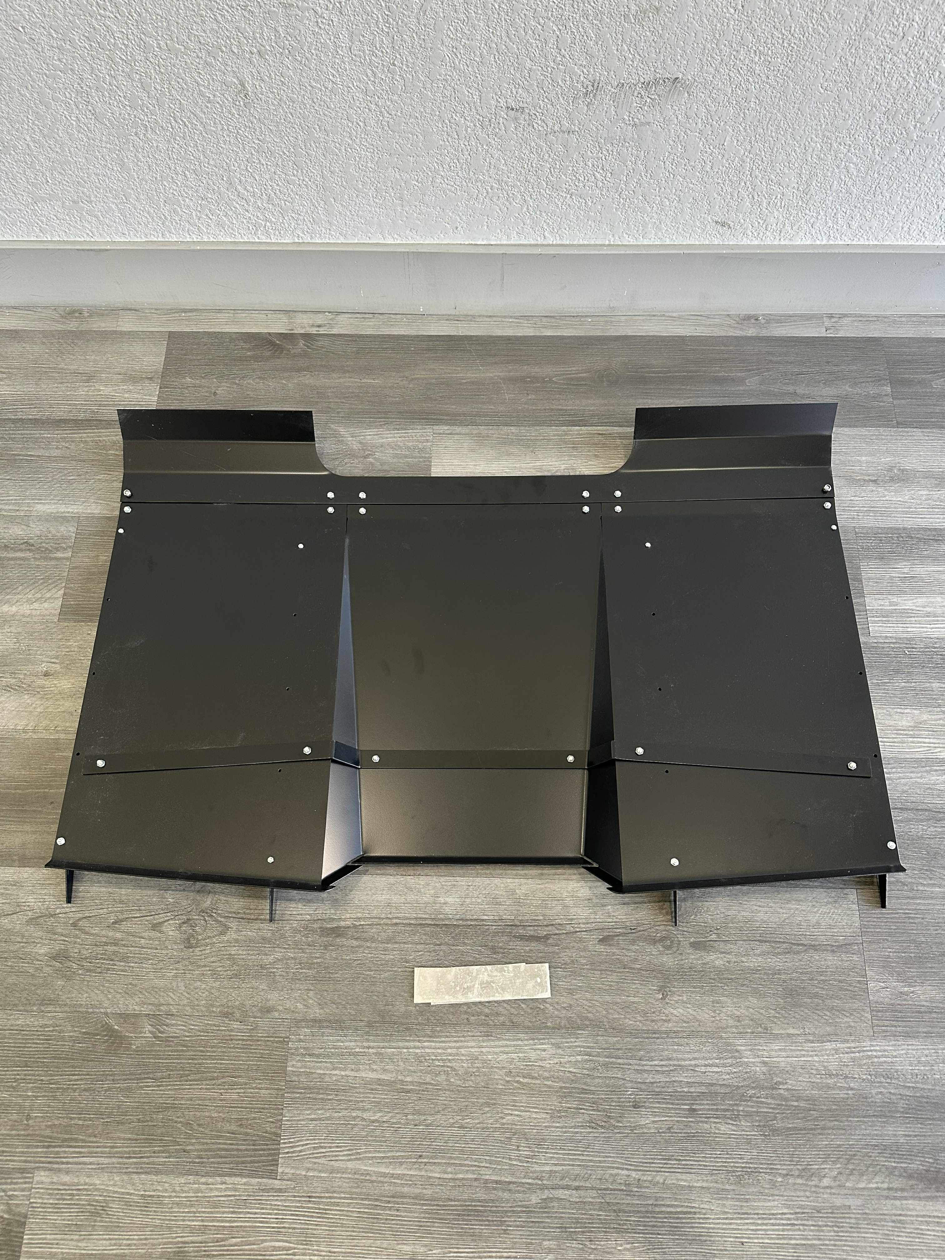 Flat lay of the V1C+ diffuser kit components including mounting brackets