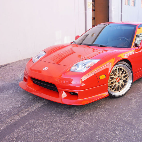 Red Honda NSX NA2 with R-GT front lip and gold wheels
