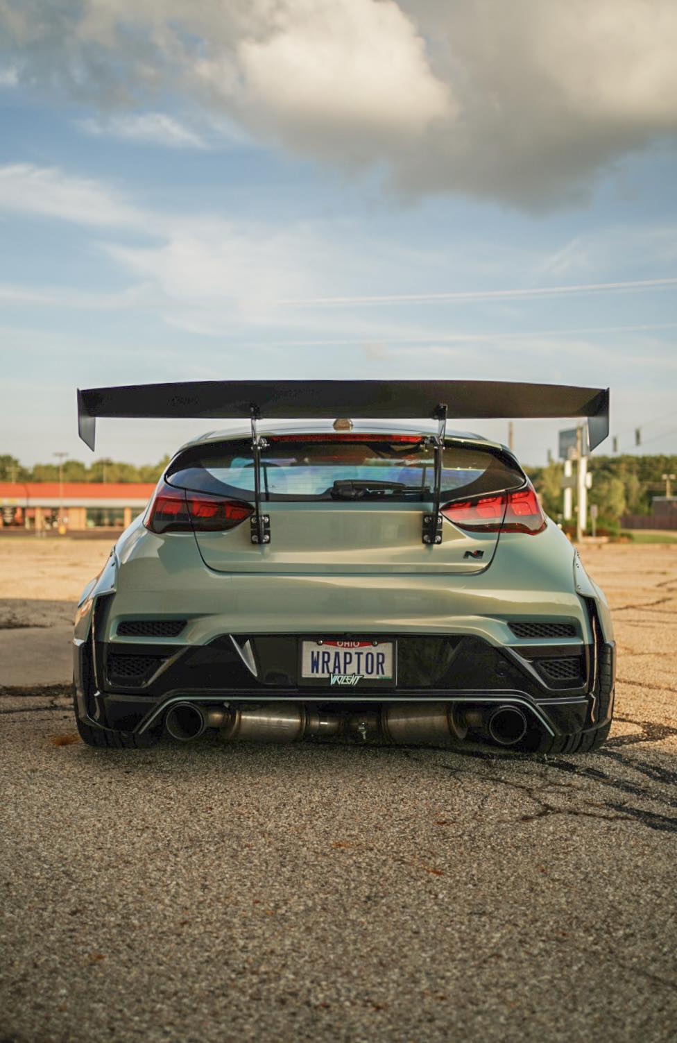 Rear view of a Hyundai Veloster JS showing the full width of the Epsilon+ GT wing