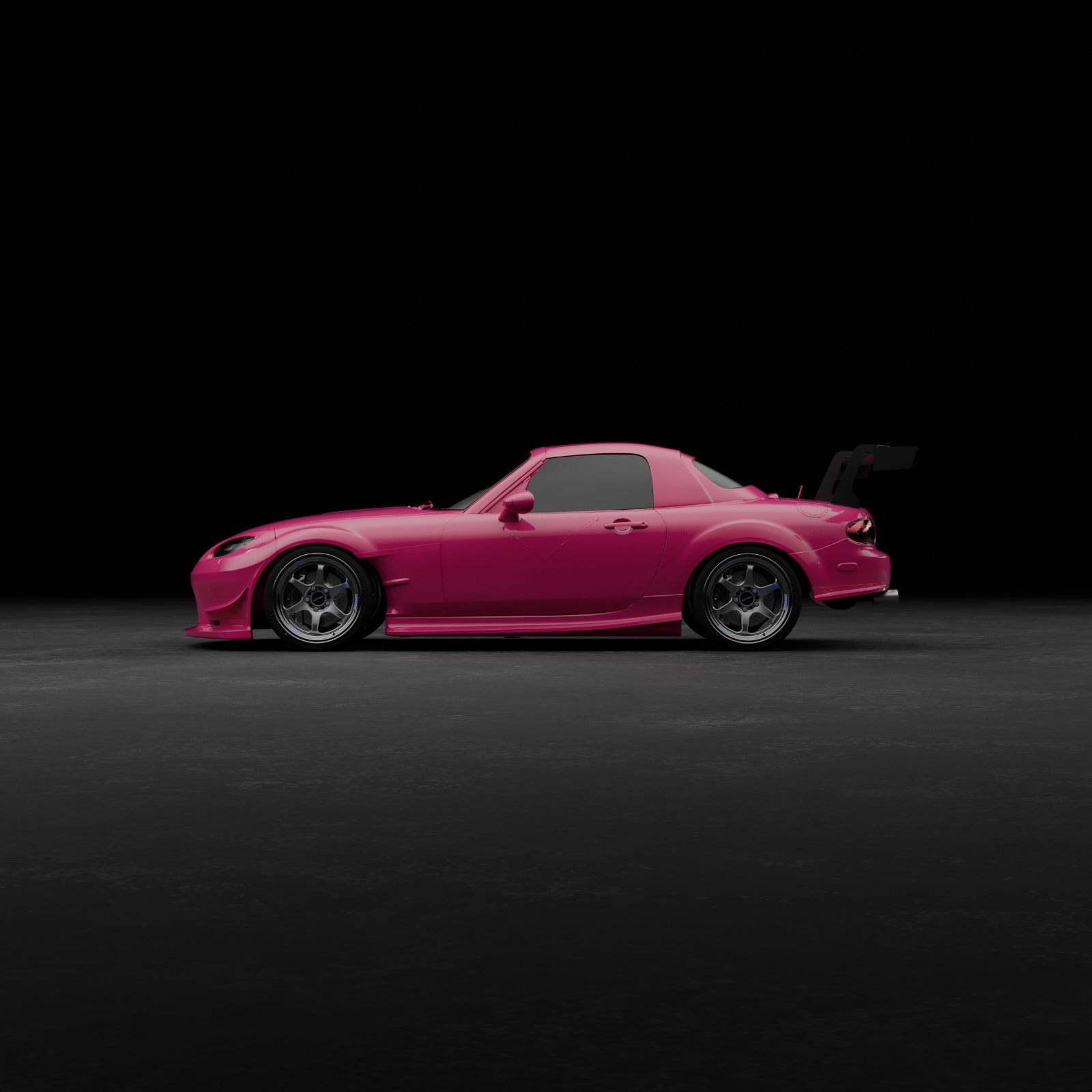 Studio side profile of a pink Mazda MX-5 Miata NC with Epsilon+ side skirts