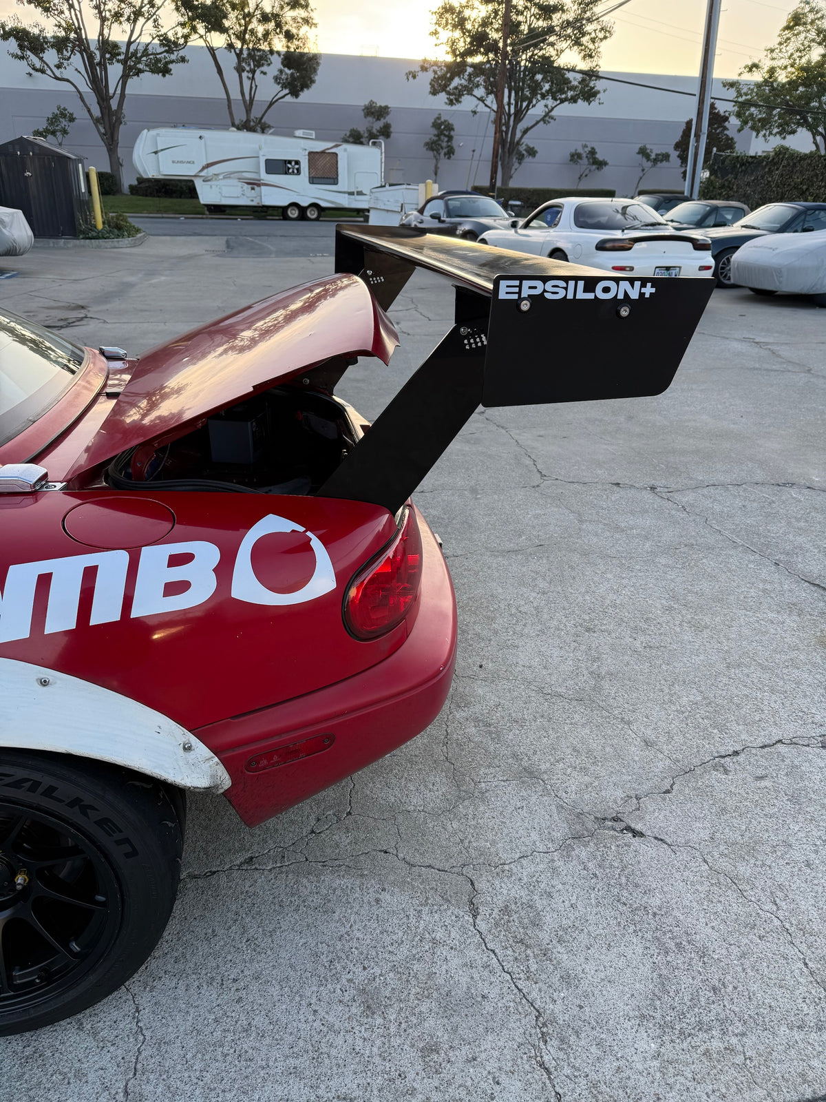 TC Wing endplate and upright on NA Miata with the trunk open, showing clearance