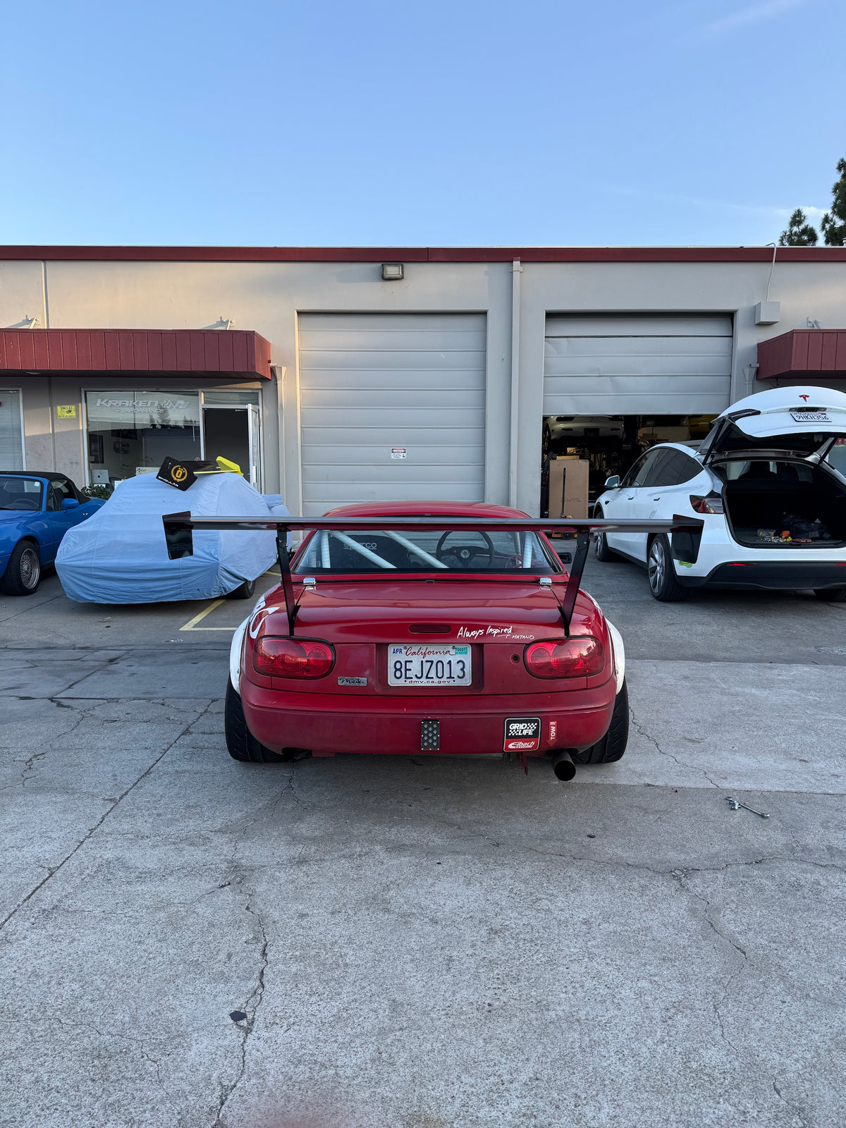 66.5" TC Wing span across the rear of a Mazda Miata NA, straight rear view