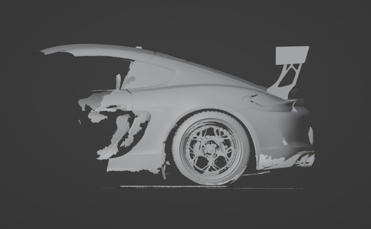 3D scan render of a Porsche Cayman side profile with GT wing fitment