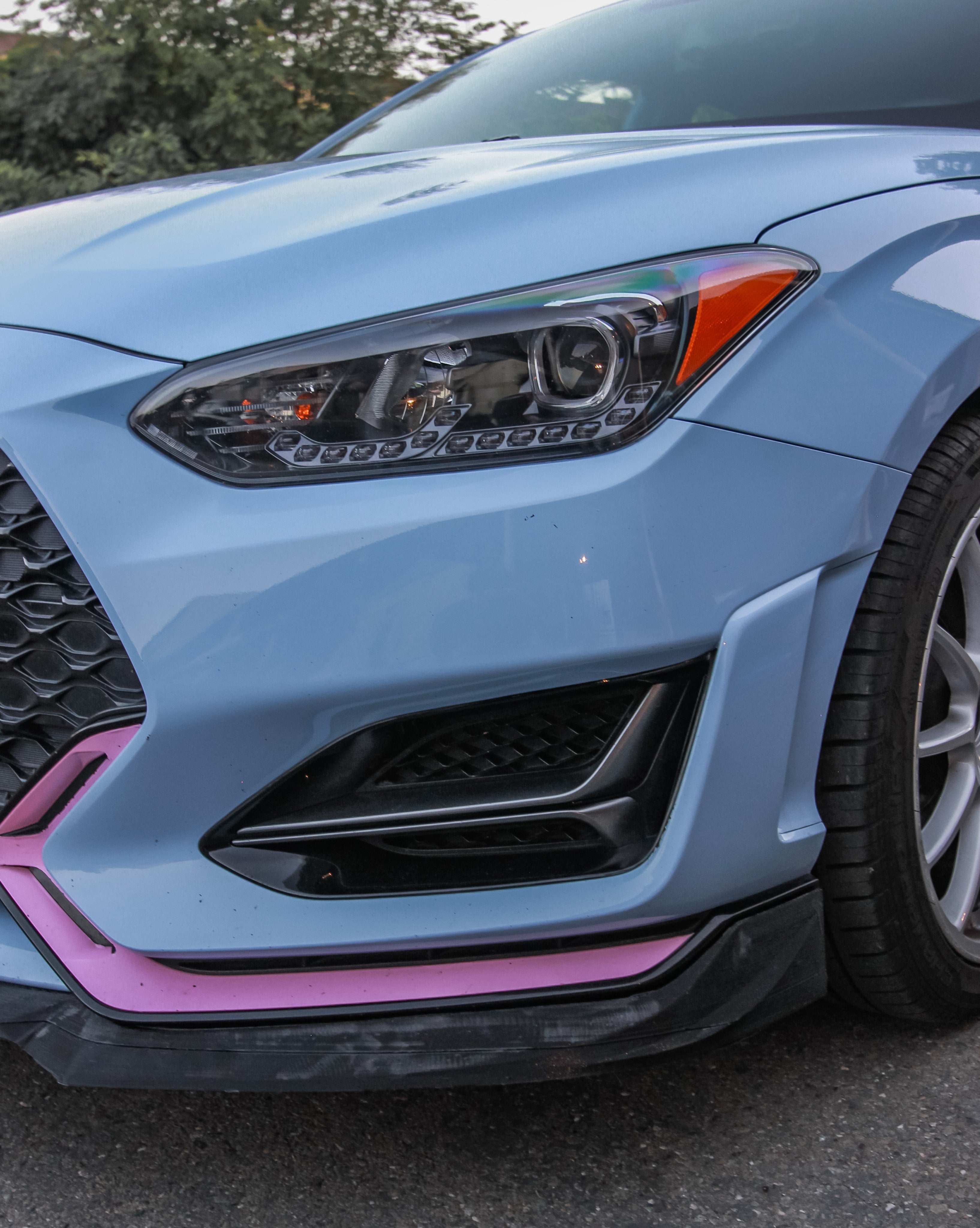 Close-up of the front lip along the lower bumper of a Hyundai Veloster N