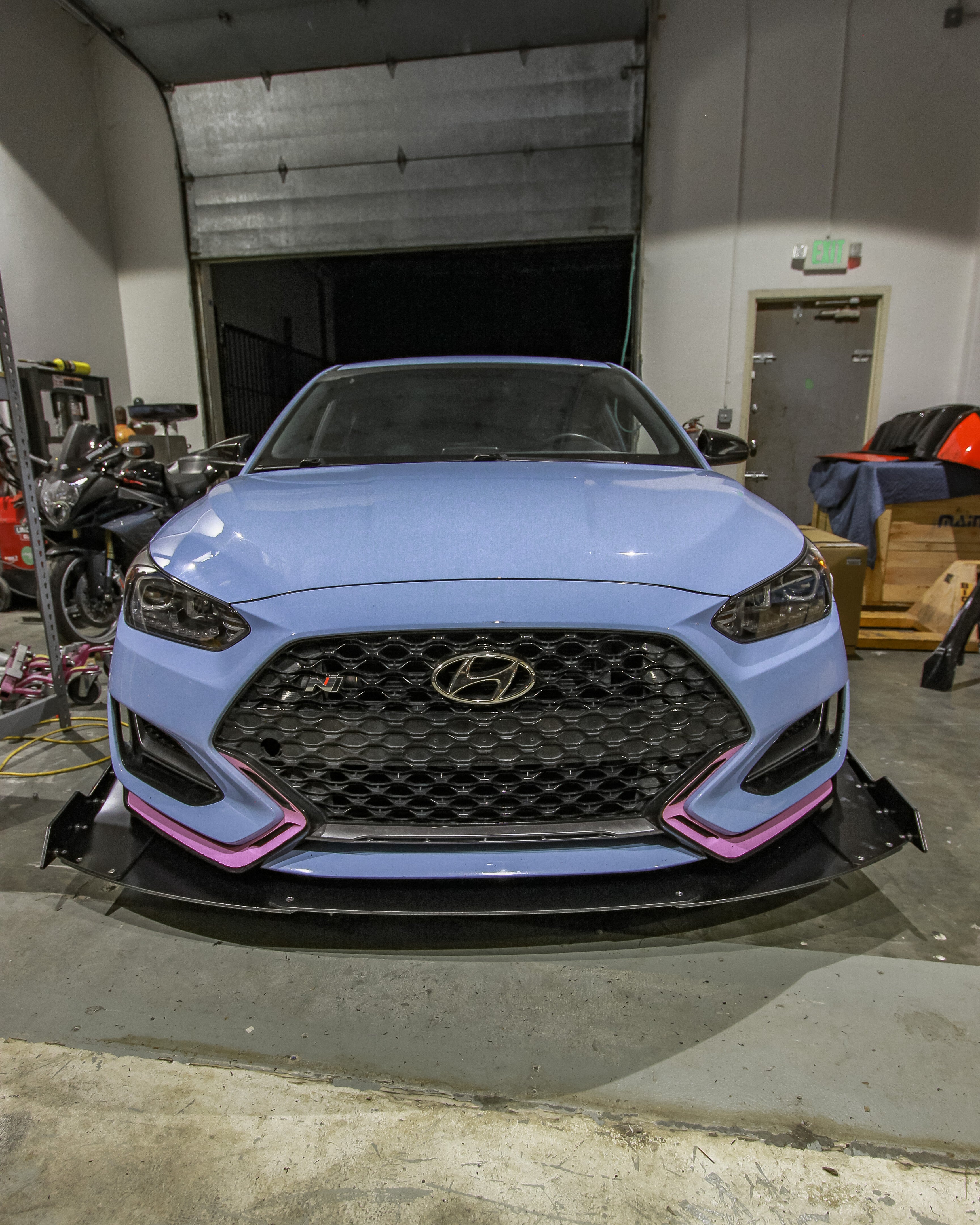 Front-on view of a Hyundai Veloster N fitted with the Epsilon+ V2 front splitter
