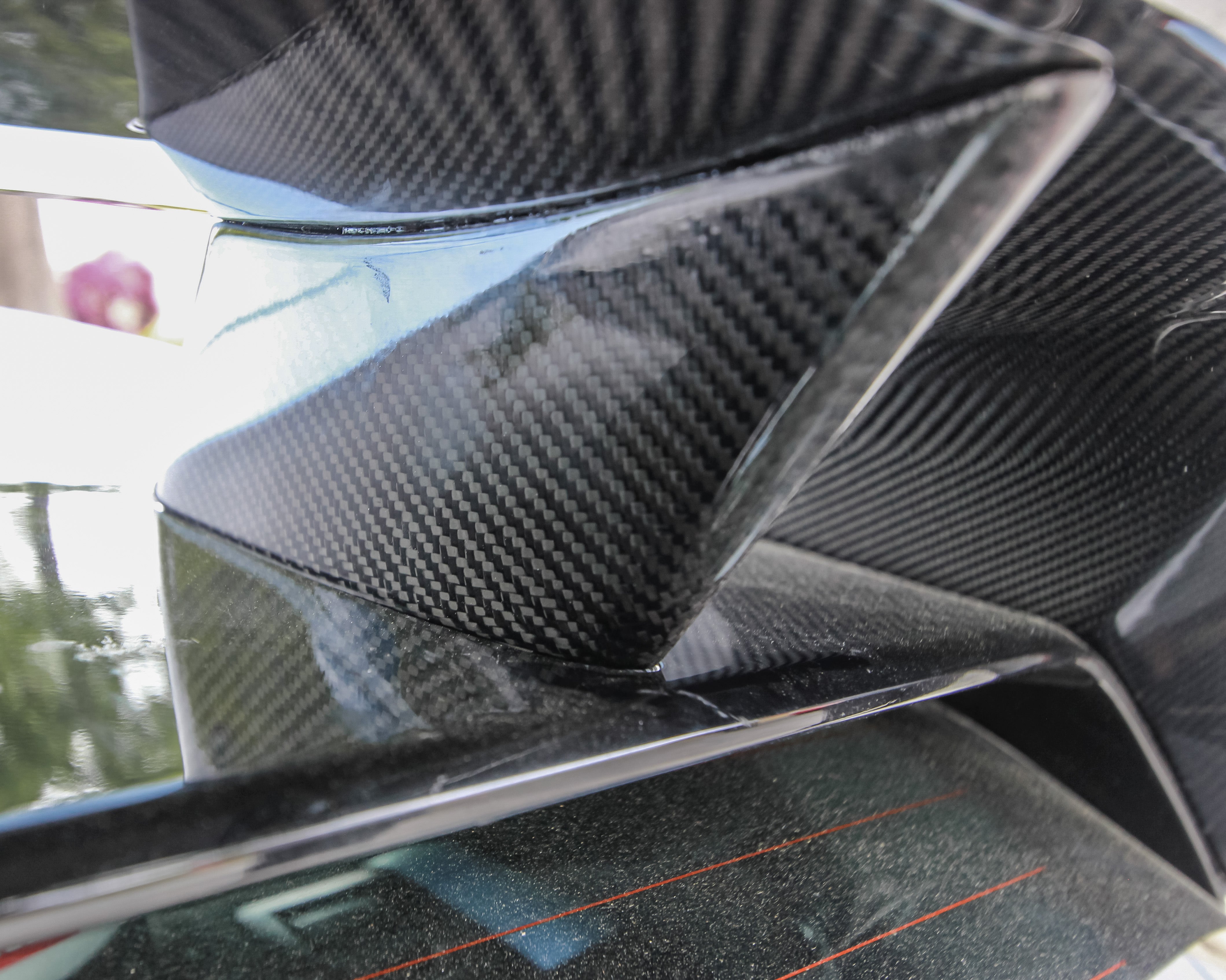 Side profile of a blue Veloster N with WRC Wing V2 installed