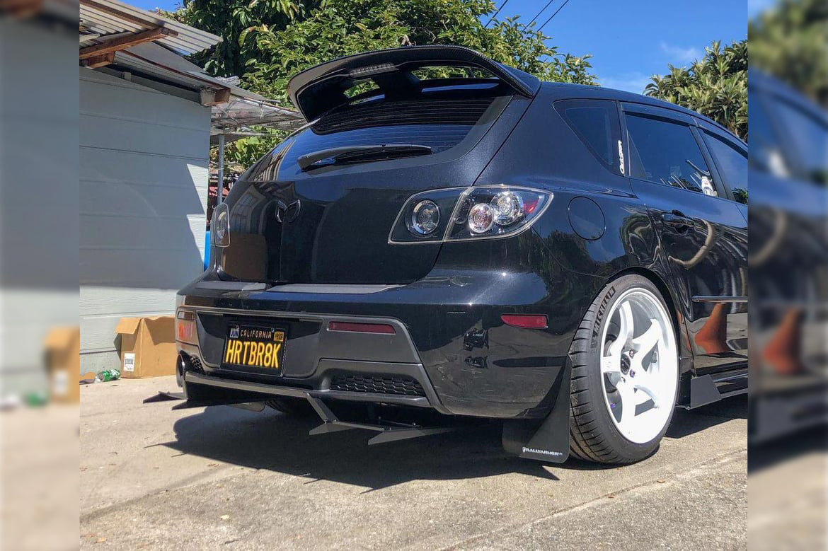 Universal rear diffuser kit, side exit fitment